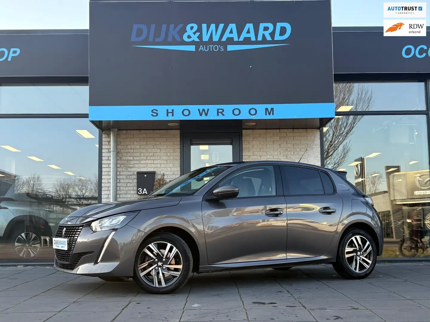 Peugeot 208 1.2 PureTech Allure | AUTOMAAT | CARPLAY | CRUISE Grijs - 1