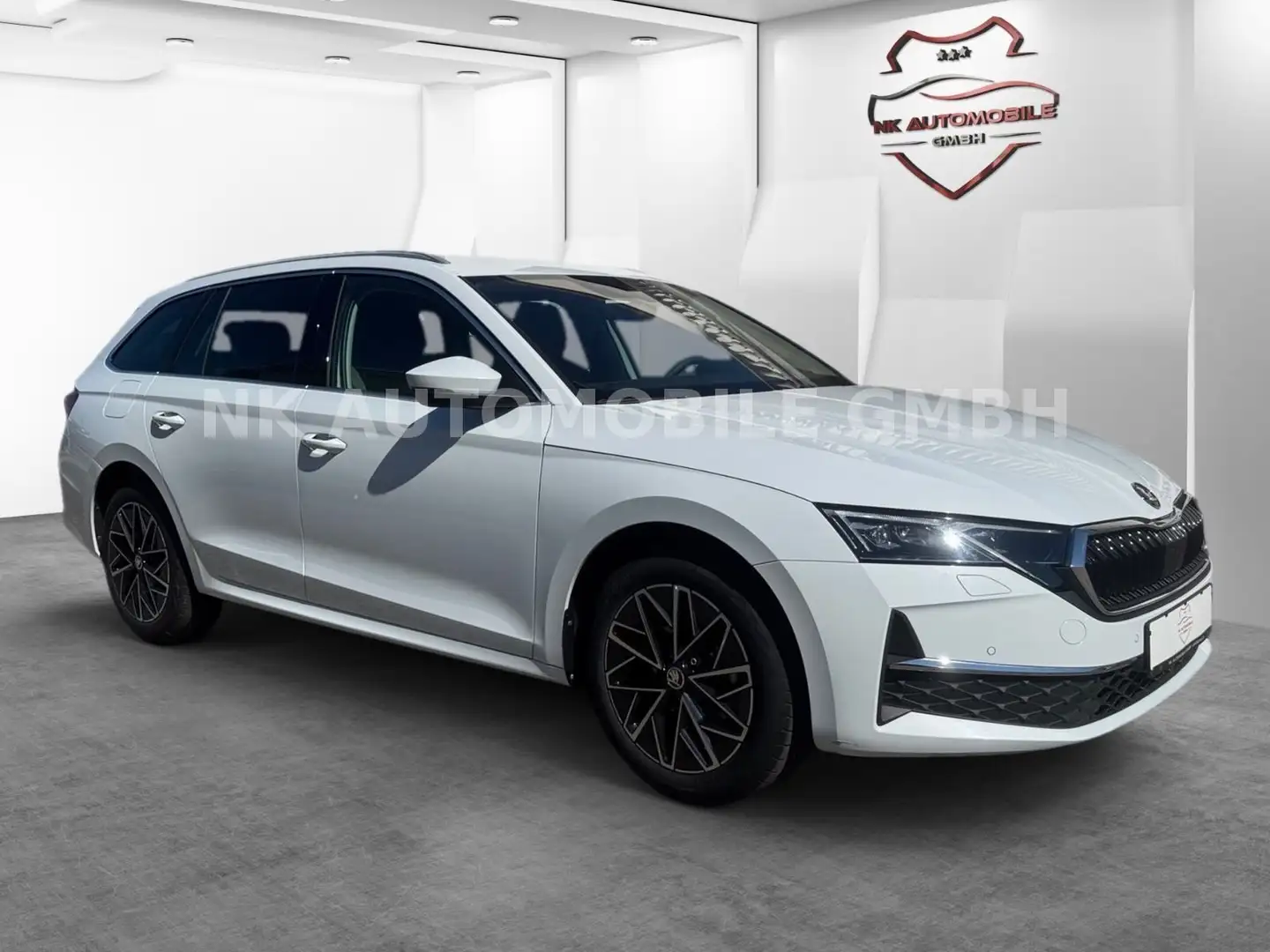 Skoda Octavia Combi 2.0 TDI 110 kW *PANO*TEILLEDER*AHK Wit - 2
