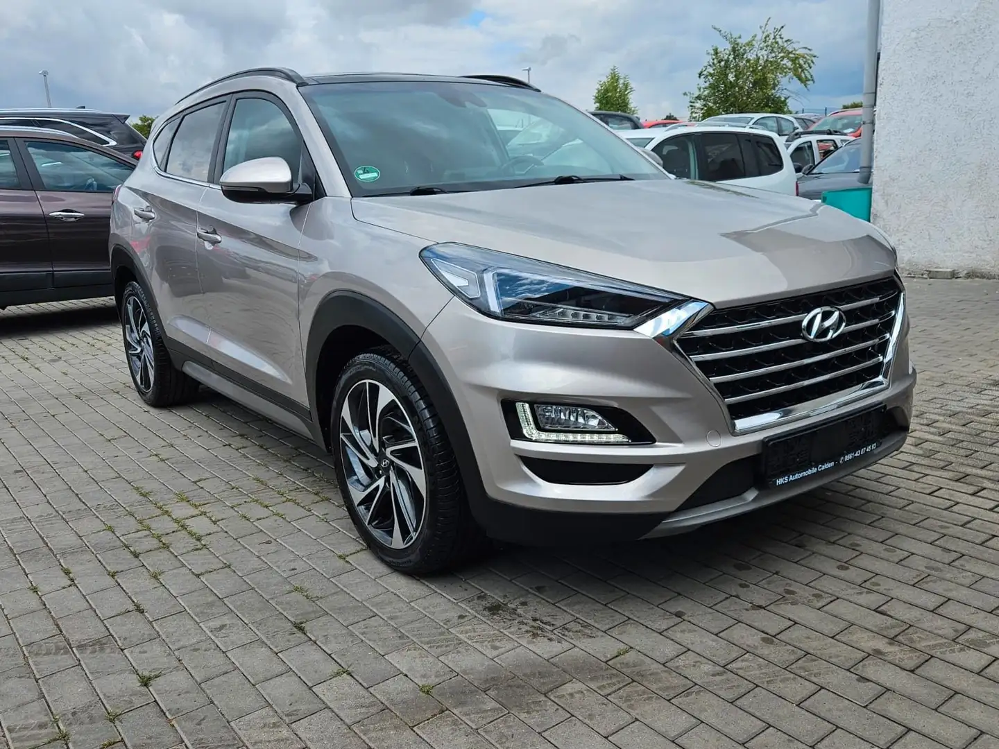 Hyundai TUCSON Style Automatik Brown - 1