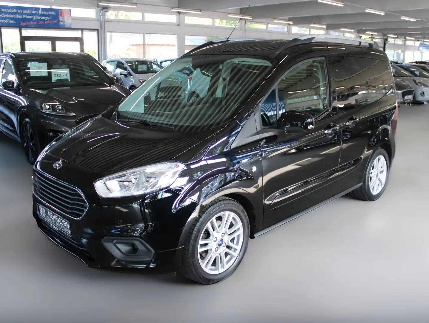 Ford Tourneo Courier Titanium Klima Winter Paket NAVI PDC CAM 1. Hand Schwarz - 2