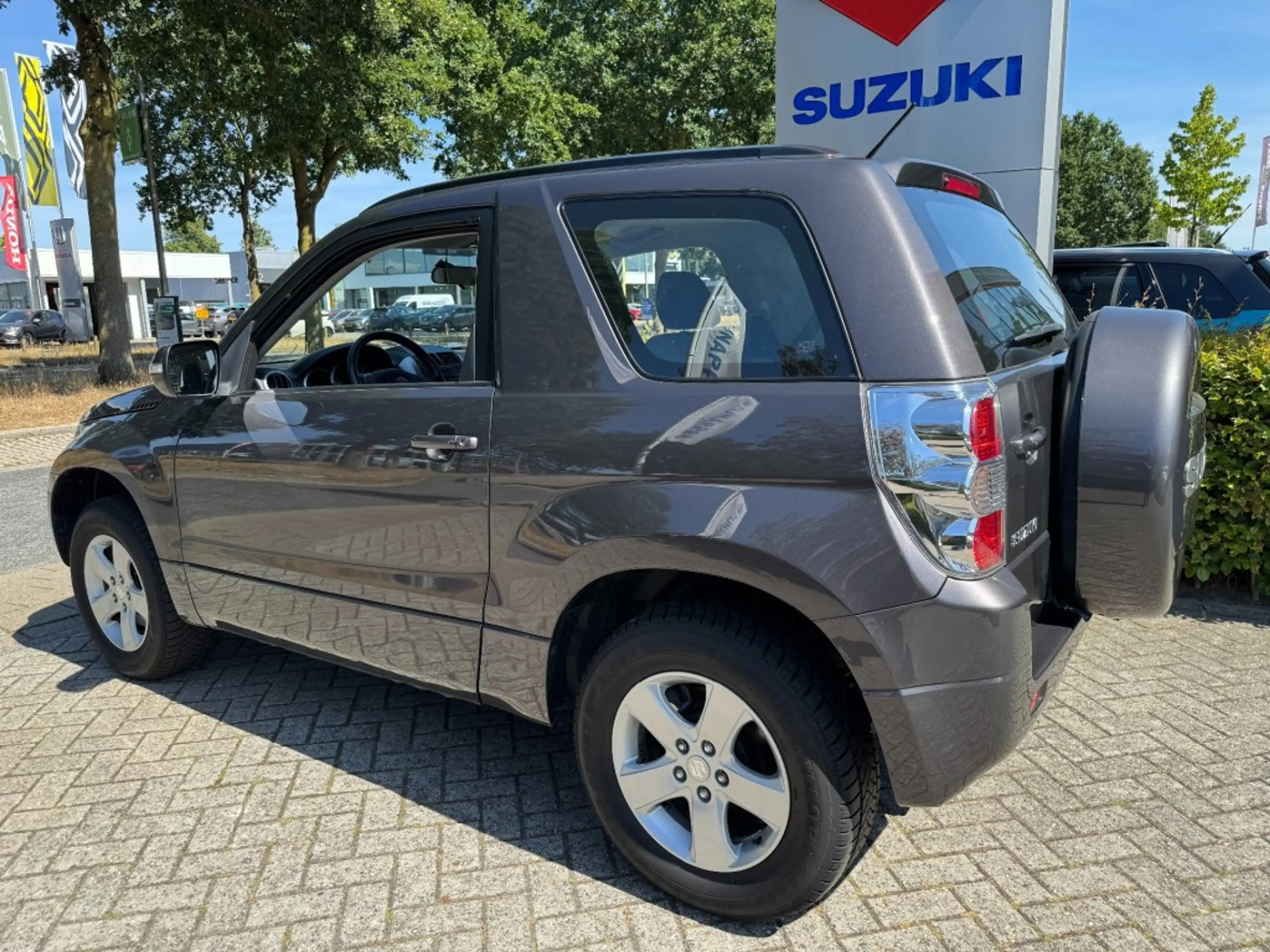 Suzuki Grand Vitara 2.4 Exclusive 3-deurs AUTOMAAT 4x4 — photo 2
