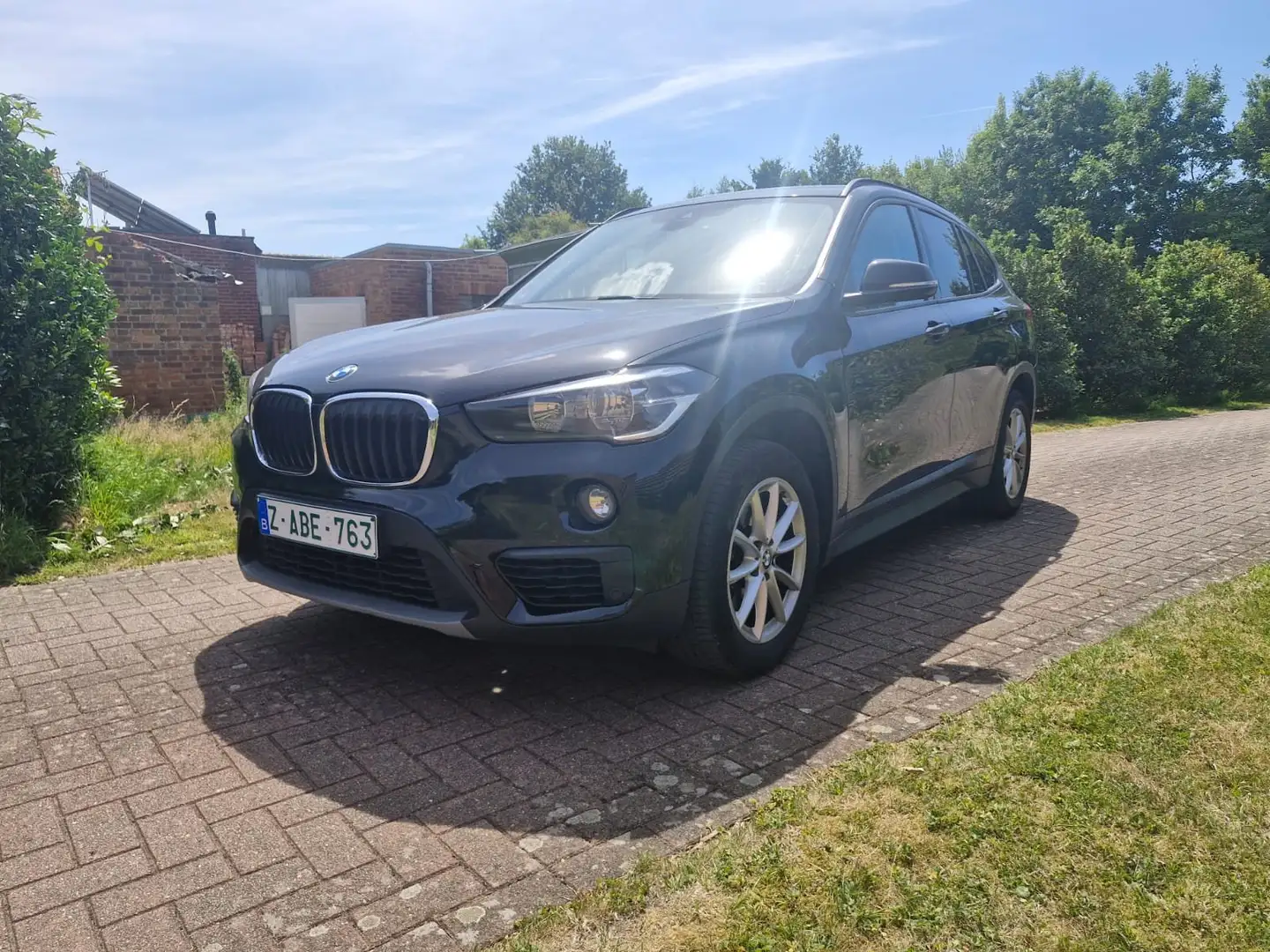 BMW X1 sDrive18i Advantage 91dkm euro6 ful optie garantie Zwart - 1