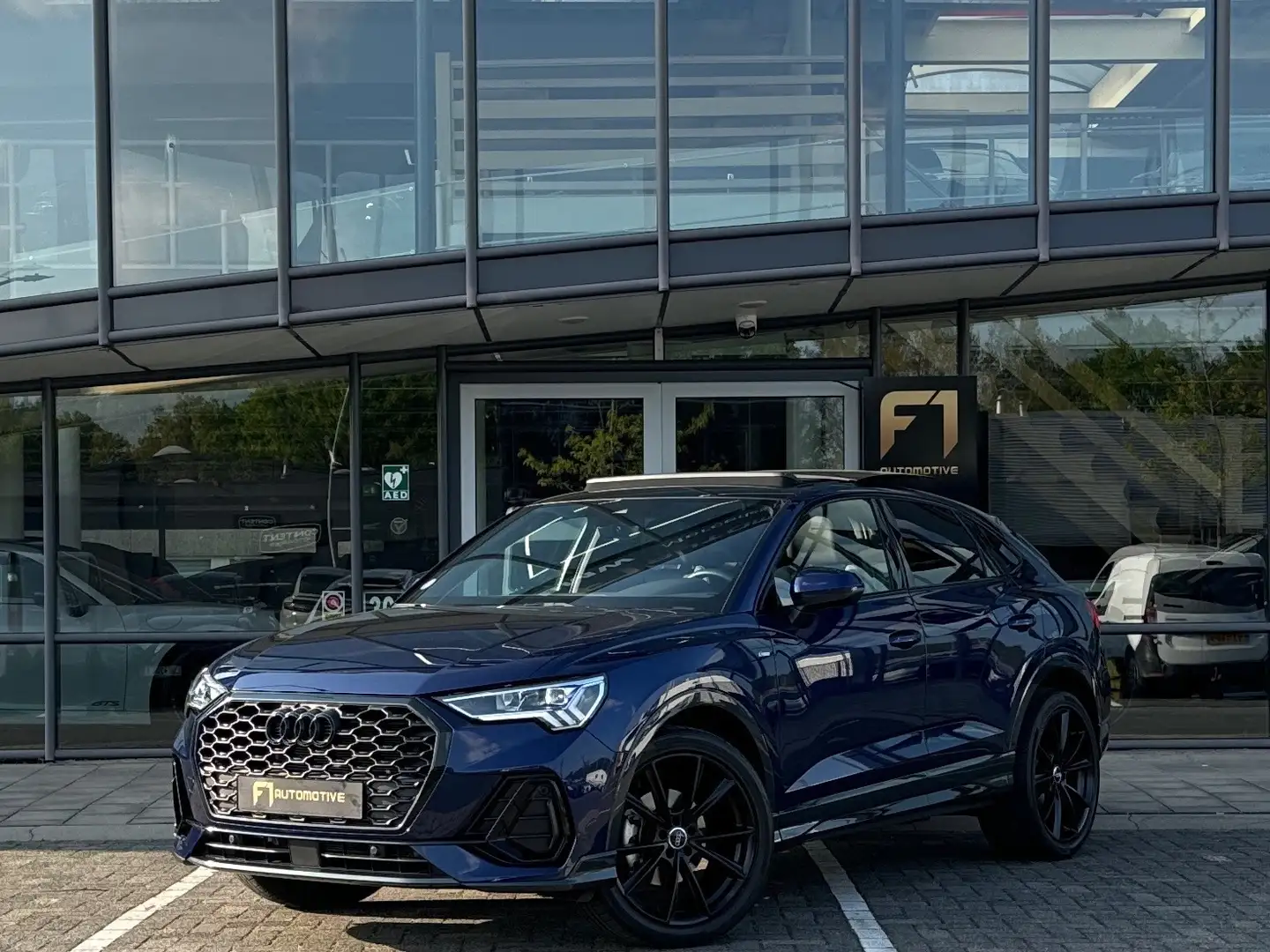 Audi Q3 Sportback 35 TFSI 2X S-Line|Pano|Leer|Keyless|Came Blauw - 1