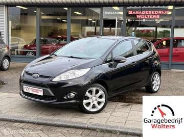 1.25 Titanium airco leder stoelverwarm. 5drs