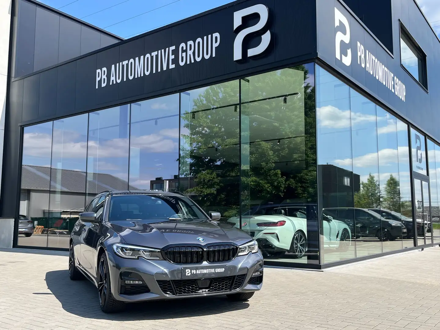 BMW 330 eaS M-Pakket-Laser-ACC-Head Up-Cam-Leer-19" Grijs - 1