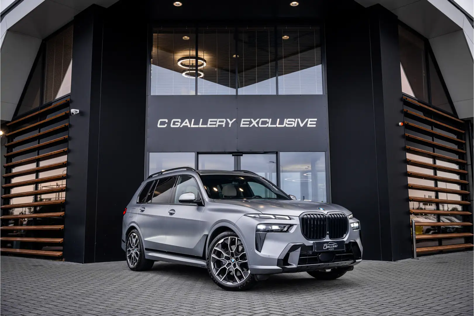 BMW X7 xDrive40i 7p. M-Sport Pro l BTW l Panorama l SoftC Grigio - 1