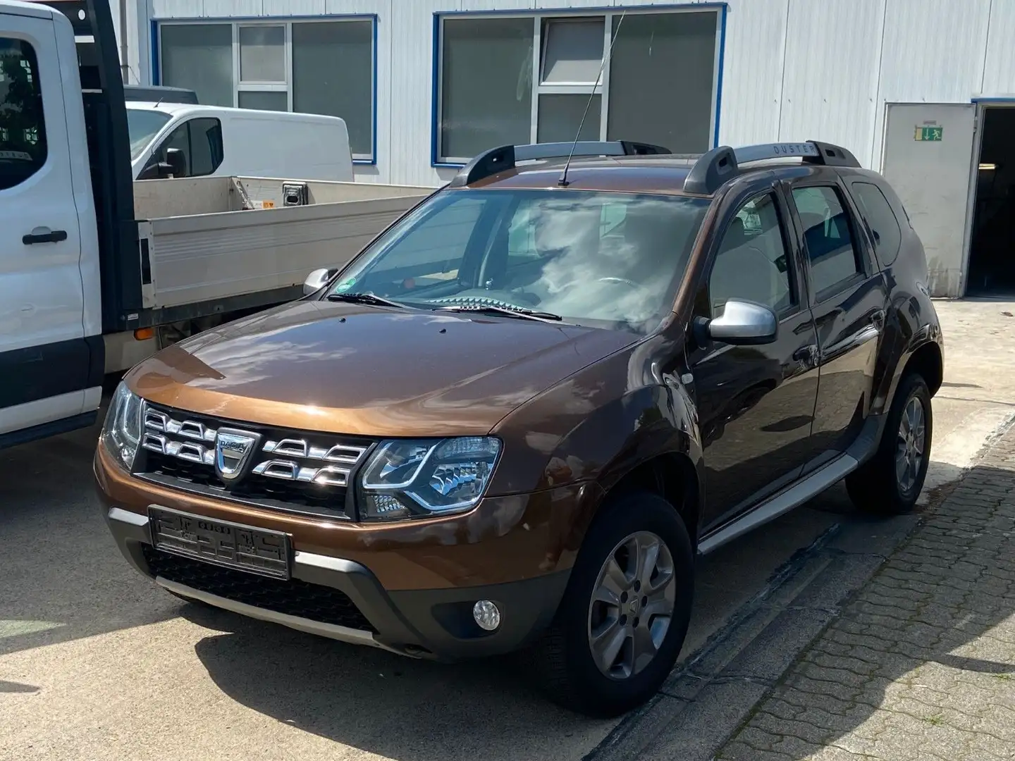 Dacia Duster I Prestige 4x2*Navi*Tempo*PDC*SHZ* Braun - 2