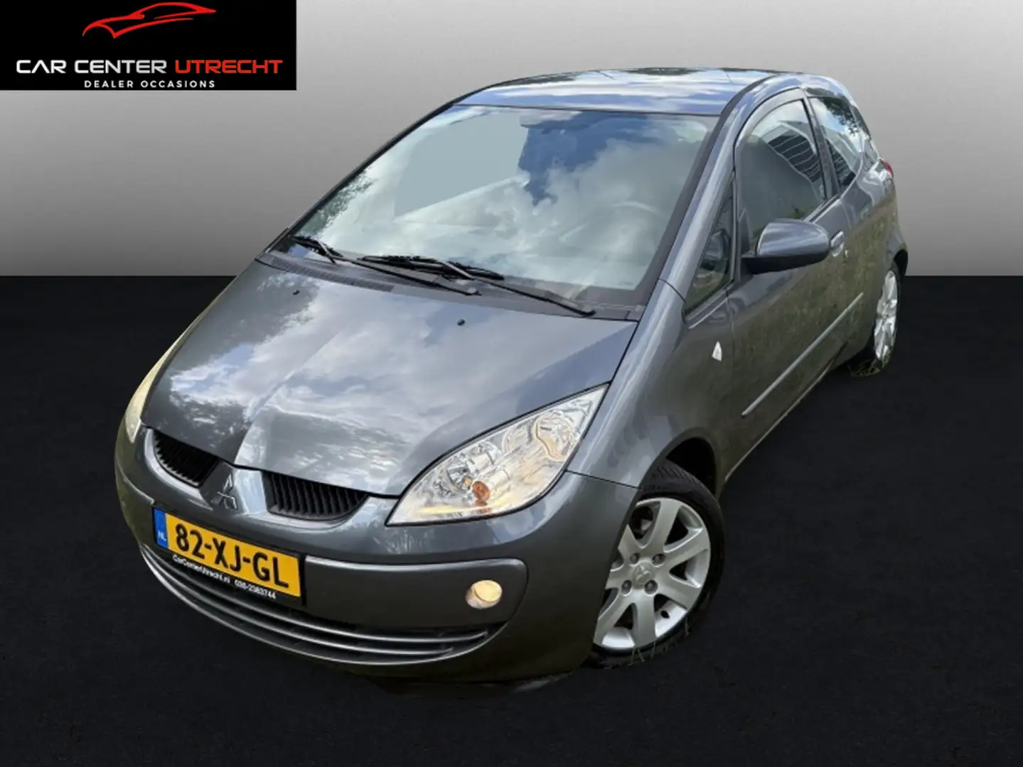 Mitsubishi Colt 1.3 Inform 3drs airco trekhaak 1ste eig Grijs - 1