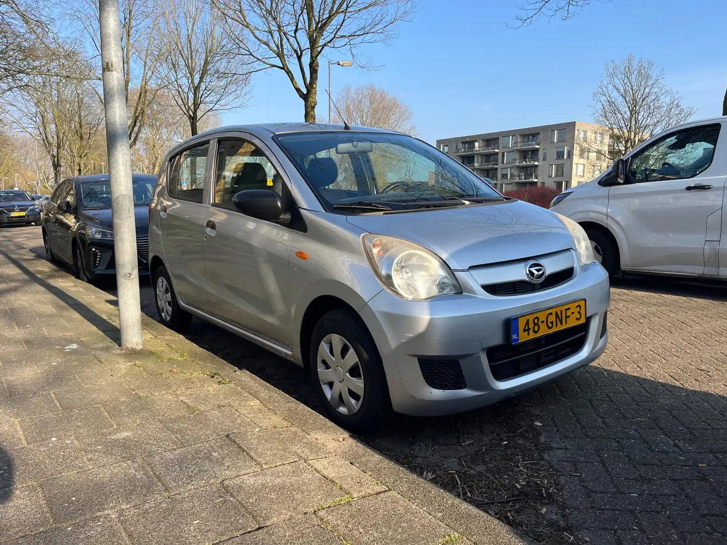 Daihatsu Cuore 1.0 Trend Grijs - 1