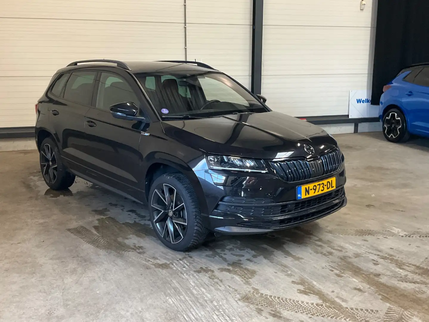 Skoda Karoq 1.5 TSI 150 pk ACT Sportline Business 7-DSG | Acht Noir - 2