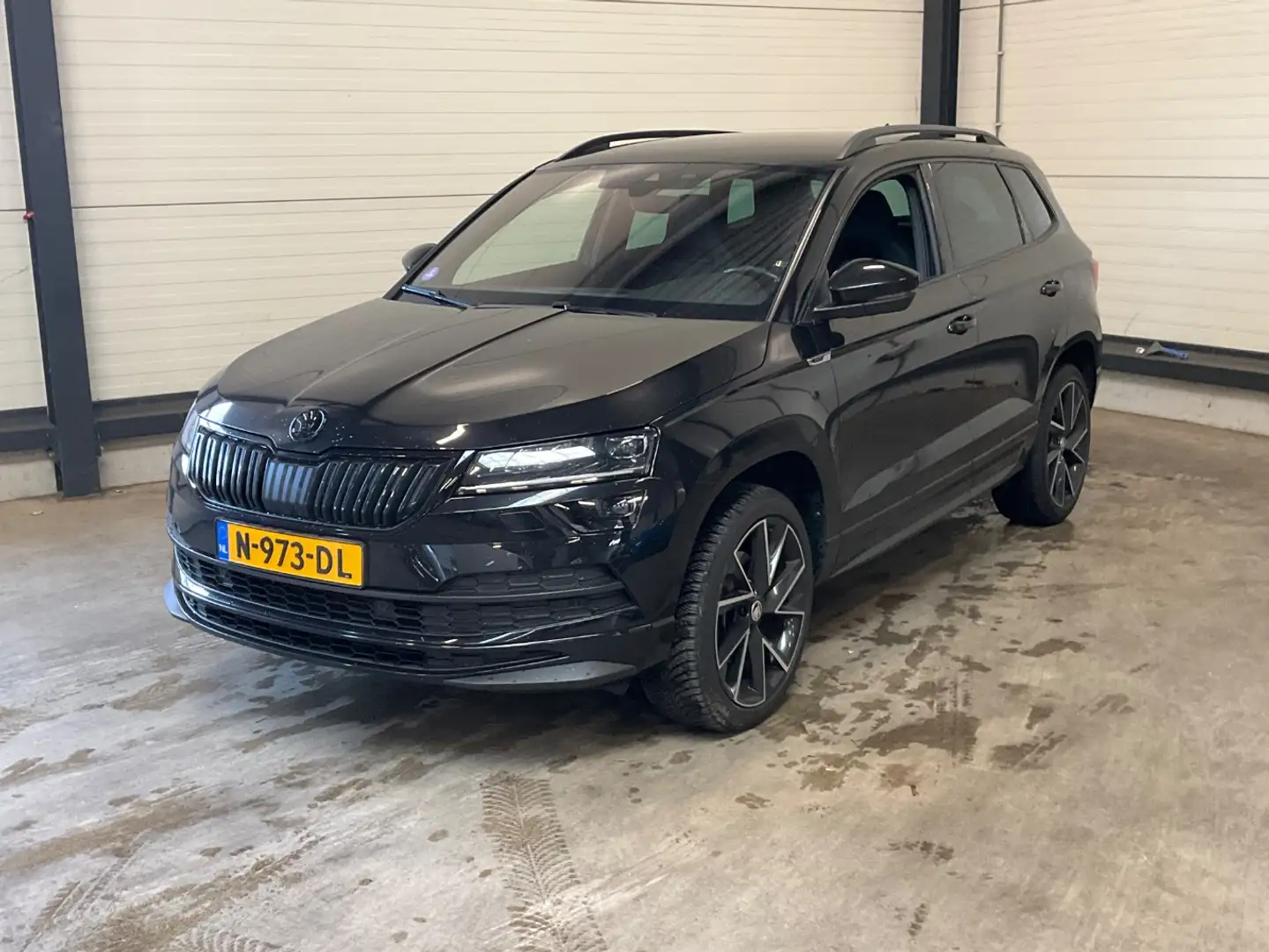 Skoda Karoq 1.5 TSI 150 pk ACT Sportline Business 7-DSG | Acht Noir - 1
