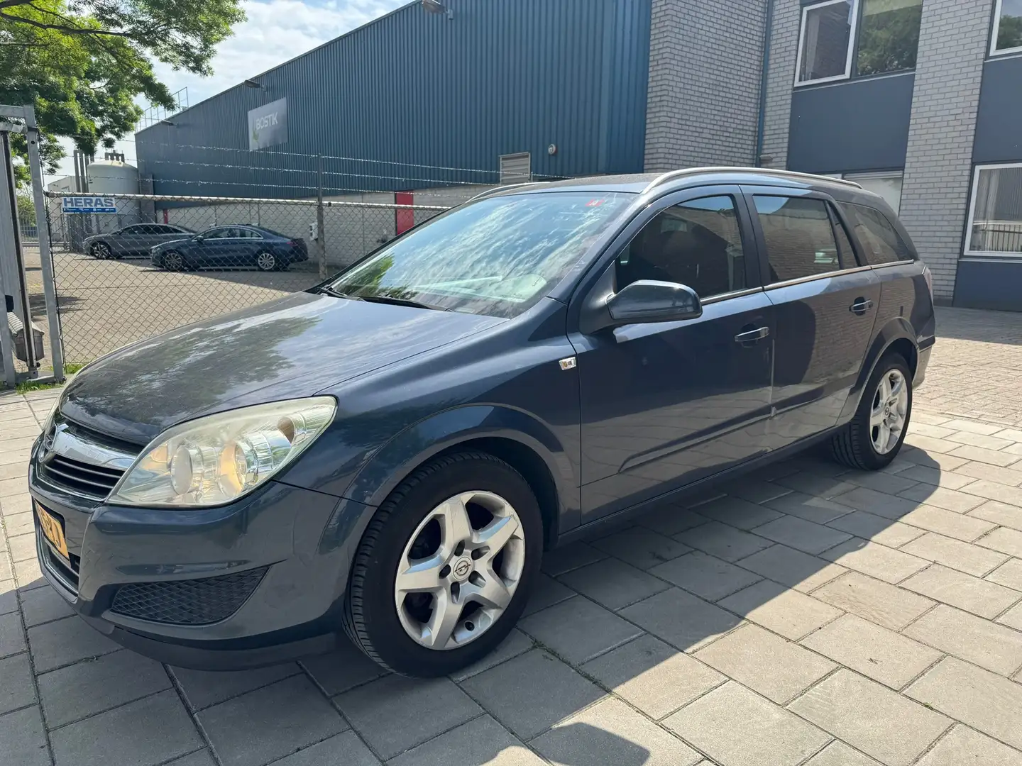 Opel Astra Wagon 1.6 Business Grijs - 1