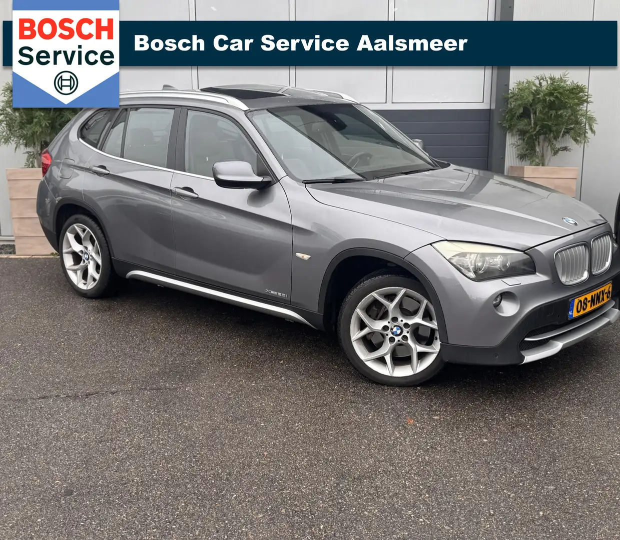 BMW X1 xDrive28i Executive / NAP / PANO / GARANTIE / LEER Grau - 1