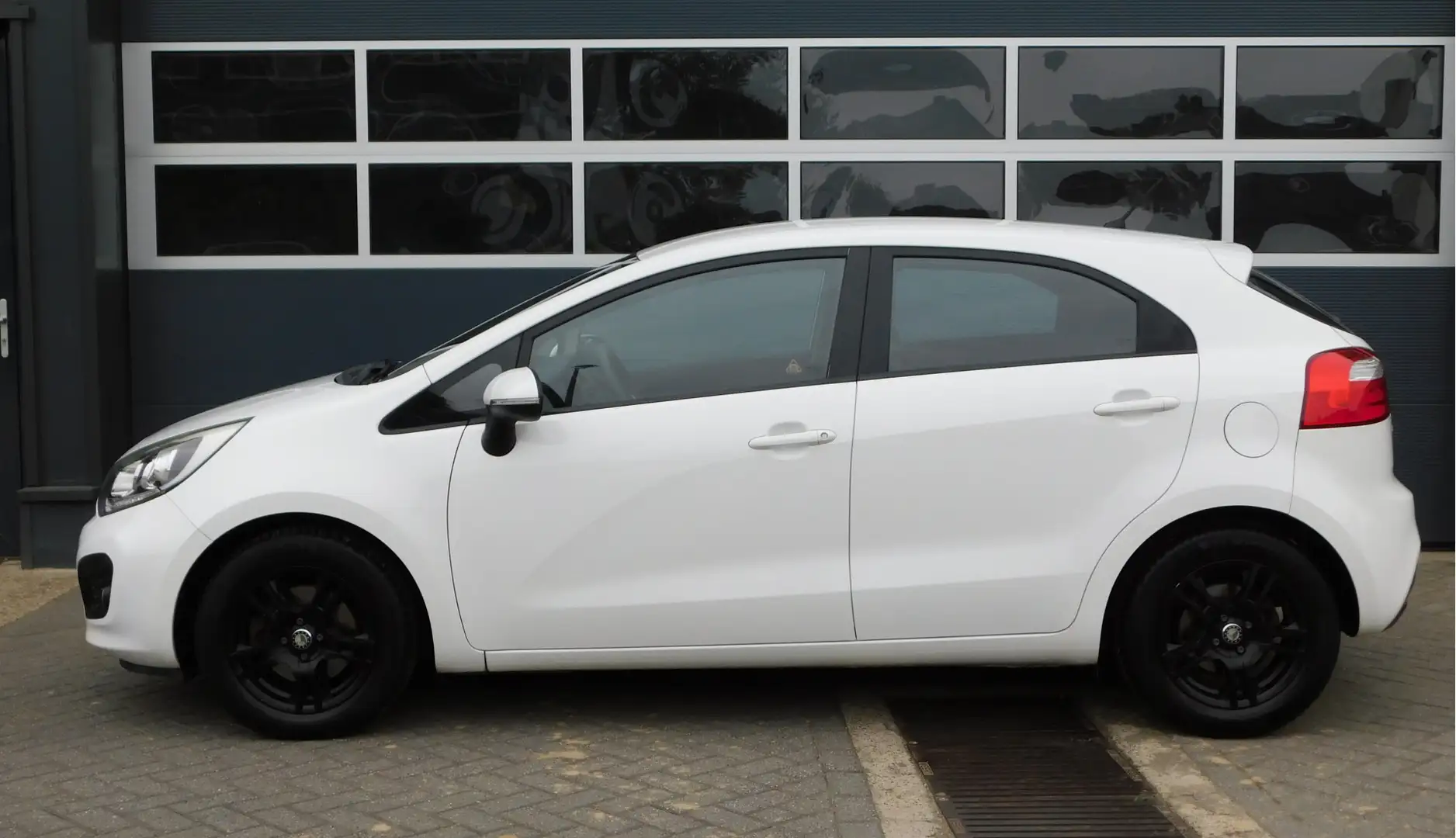 Kia Rio 1.4 CVVT Plus Pack Automaat | Airco/Voll. historie Wit - 2