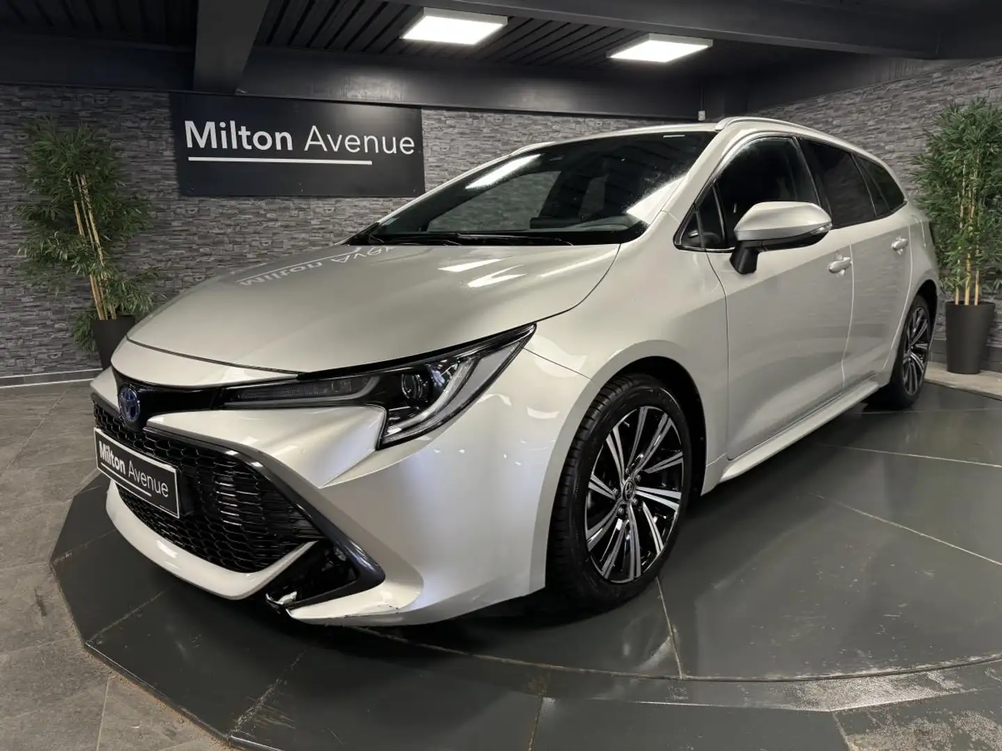 Toyota Corolla Corolla Touring Sports Hybride 122h - BV CVT Desig Gris - 1
