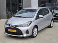 Toyota Yaris 1.3 VVT-i Aspiration 12.000km! 1e eig NL-auto NAP Grijs - thumbnail 2