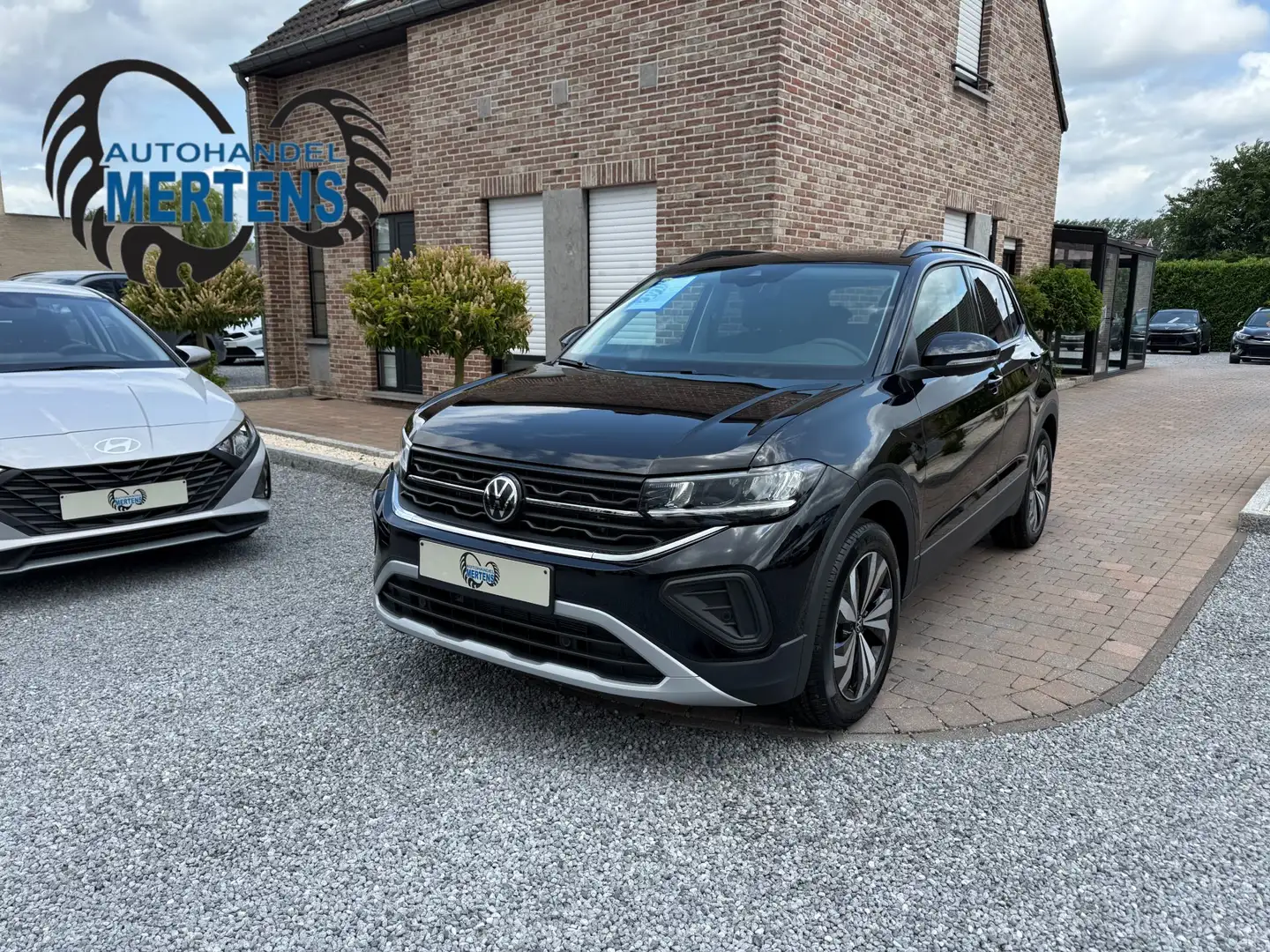 Volkswagen T-Cross 1.0 TSI 116PK DSG AR/CAM PDC V+A ACC ALU NIEUW 0KM Zwart - 1