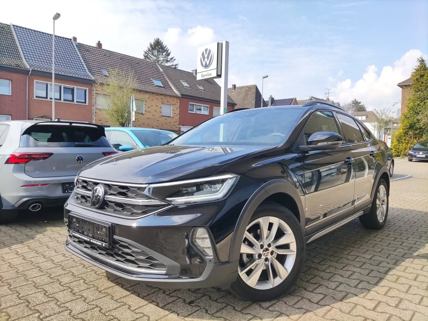 Volkswagen Taigo Move IQ DRIVE,AHK,NAV,KAM,GJR Schwarz - 1