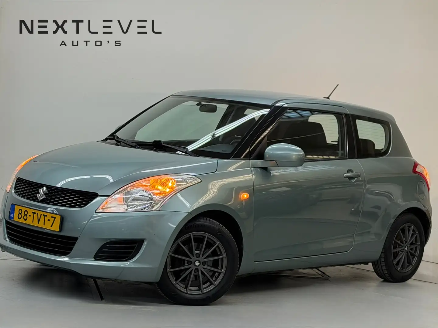 Suzuki Swift 1.2 Comfort EASSS Airco Stoelverwarming Nieuw APK Grün - 1