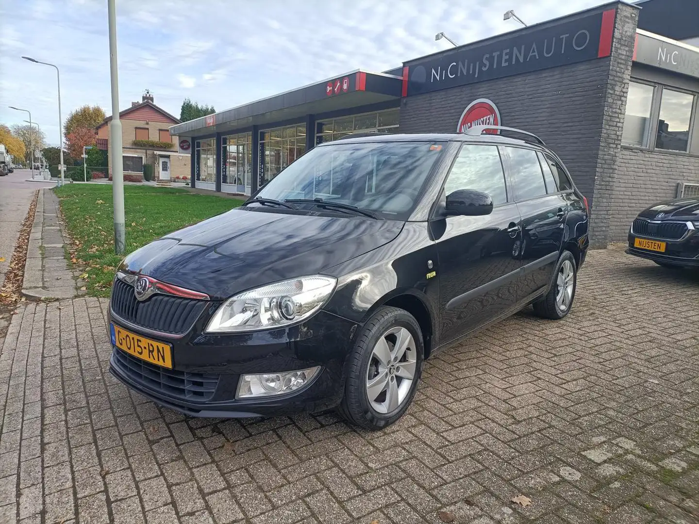 Skoda Fabia COMBI 1.2 Airco, Clima, Cruise, PDC , LM wielen Zwart - 1
