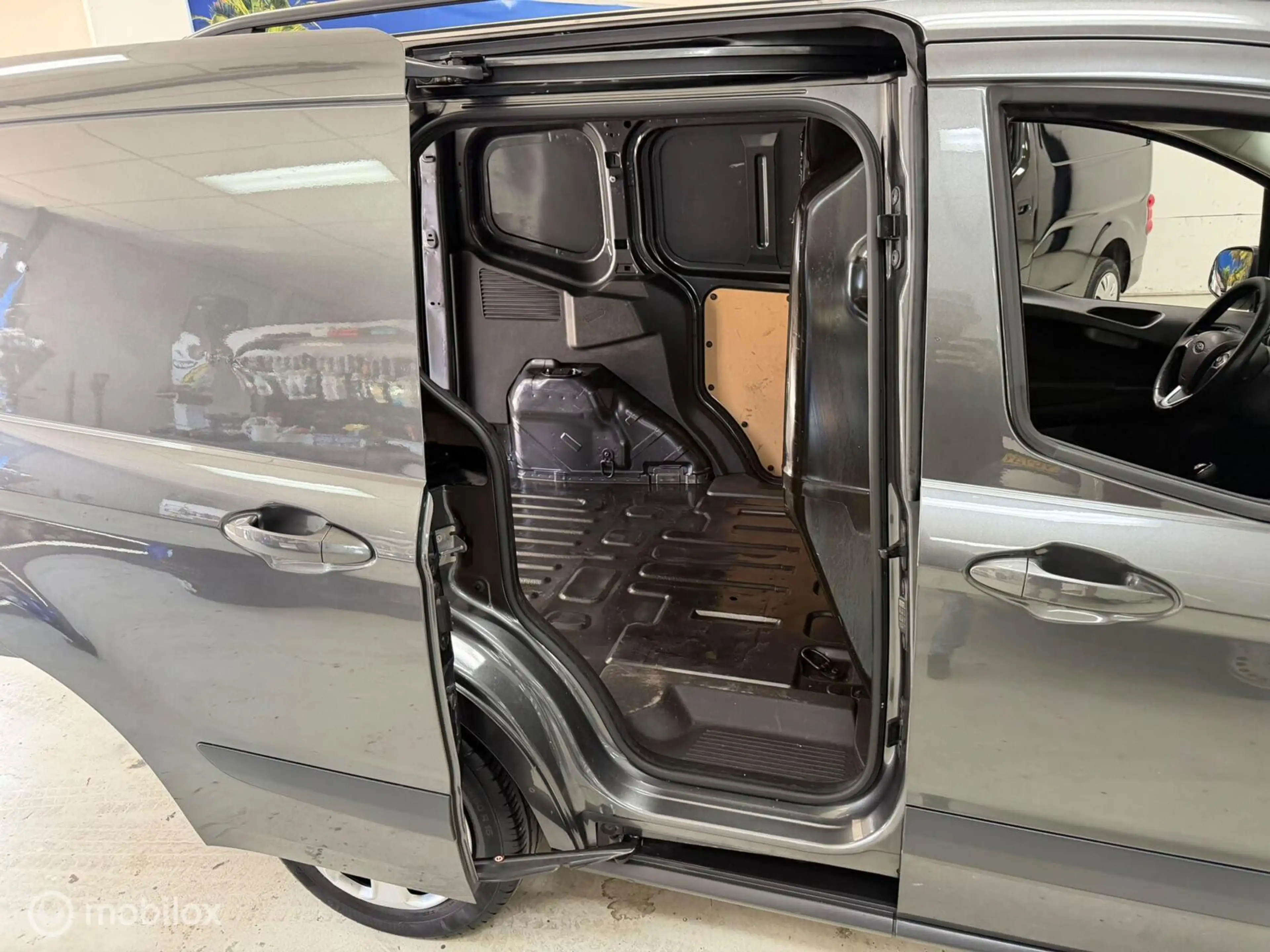 Ford Transit Courier 1.5 TDCI Airco Cruise — photo 11