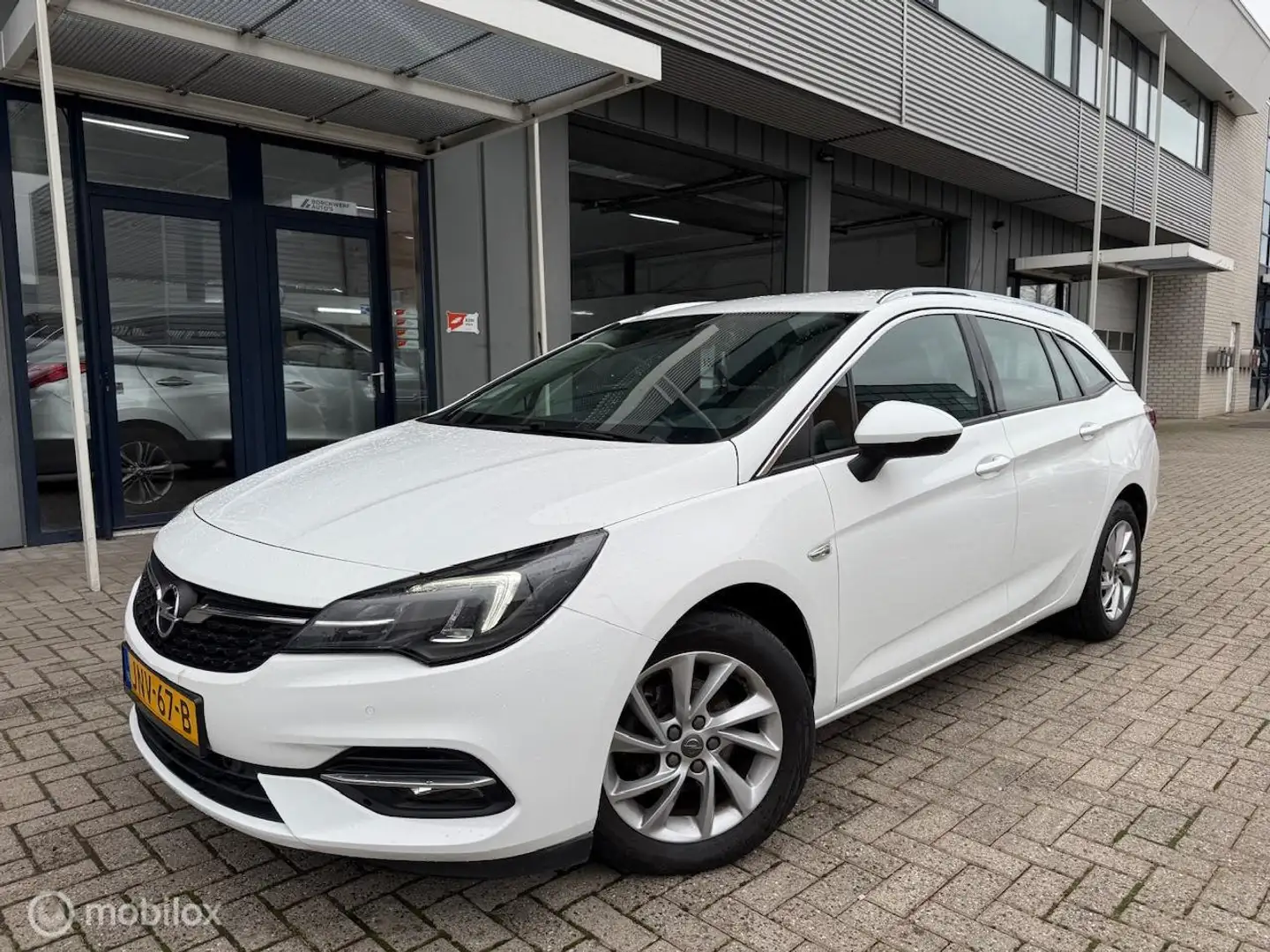 Opel Astra Sports Tourer 1.2 BENZINE | NAVIGATIE | NETTE STA - 1