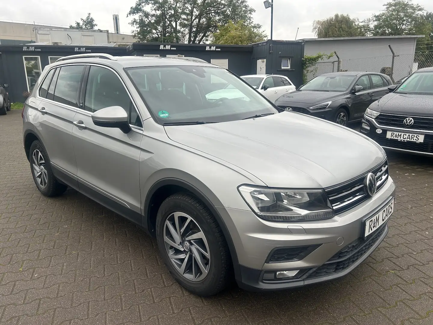 Volkswagen Tiguan 1.4 TSI Act 150PS DSG Sound/AHK/NAVI Zilver - 1