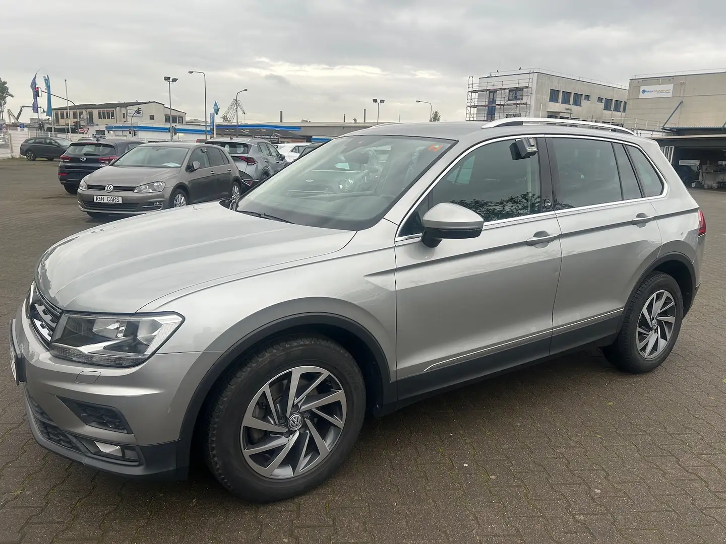 Volkswagen Tiguan 1.4 TSI Act 150PS DSG Sound/AHK/NAVI Zilver - 2