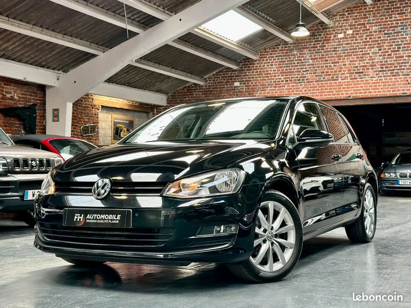 Volkswagen Golf VII 1.2L TSI 85 ch Confortline Sièges chauffants H Noir - 1
