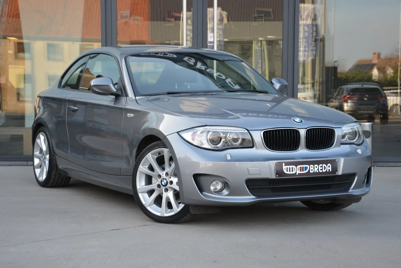 BMW 118 d Coupe/ PDC/ Trekhaak/ Xenon/ Sportstoel/ Alu 18" Gris - 1