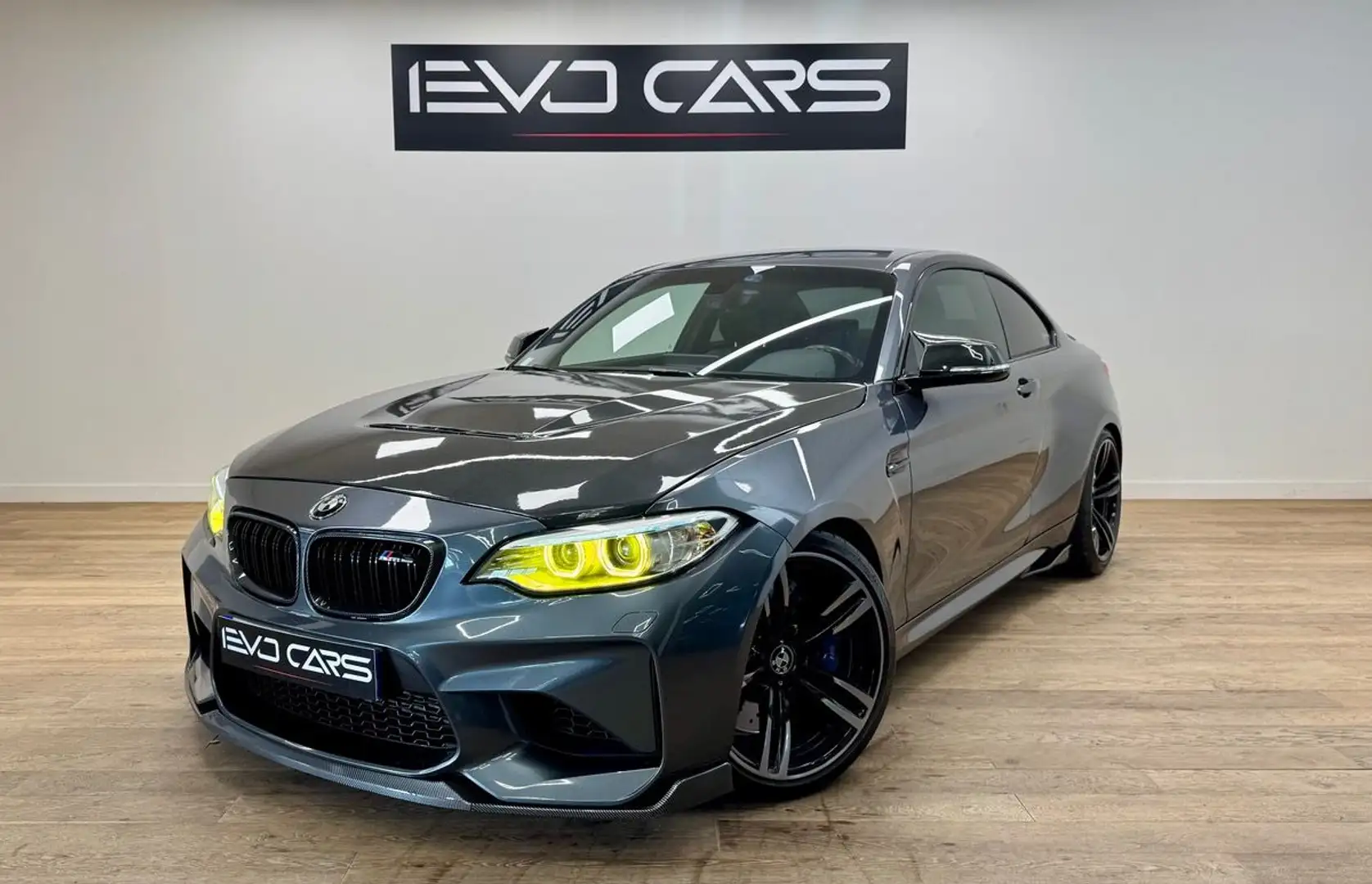 BMW M2 370 ch DKG Suivi / Echapp Mperf à clapet / Capot CS / HK / Sièges électriques à mémoires Gris - 1