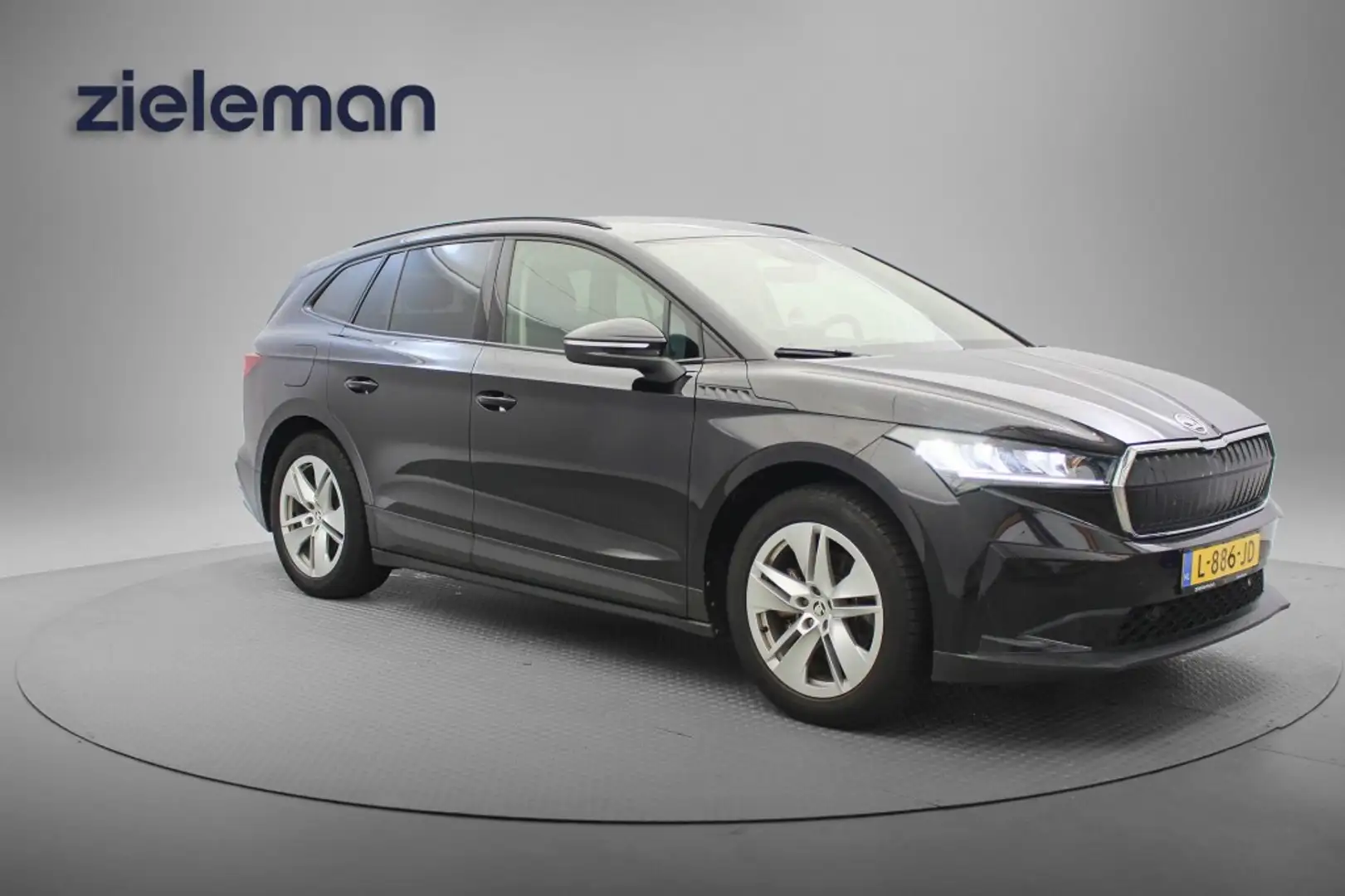 Skoda Enyaq iV 60 - Carplay, Stoelverwaming, Leer, Camera, Cru Zwart - 1