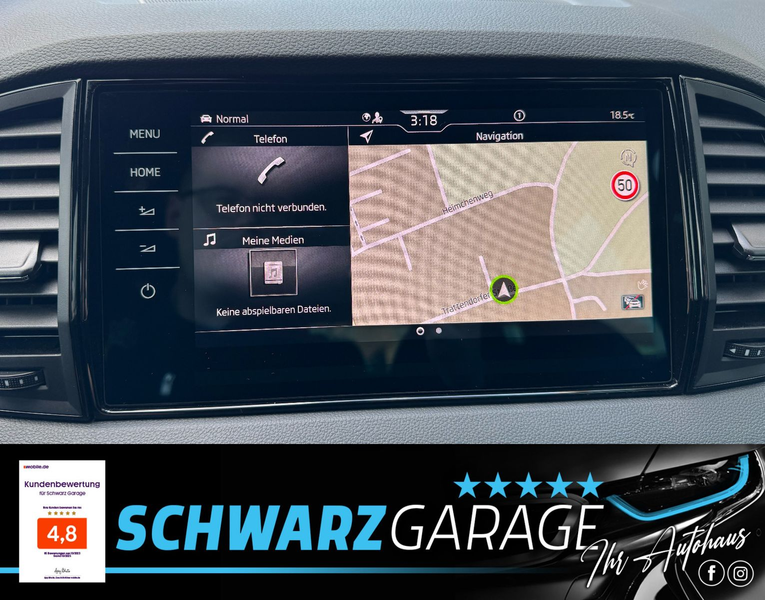 Skoda Karoq 2.0l TDI DSG 4x4*AHK*NAVI*LED* — photo 11
