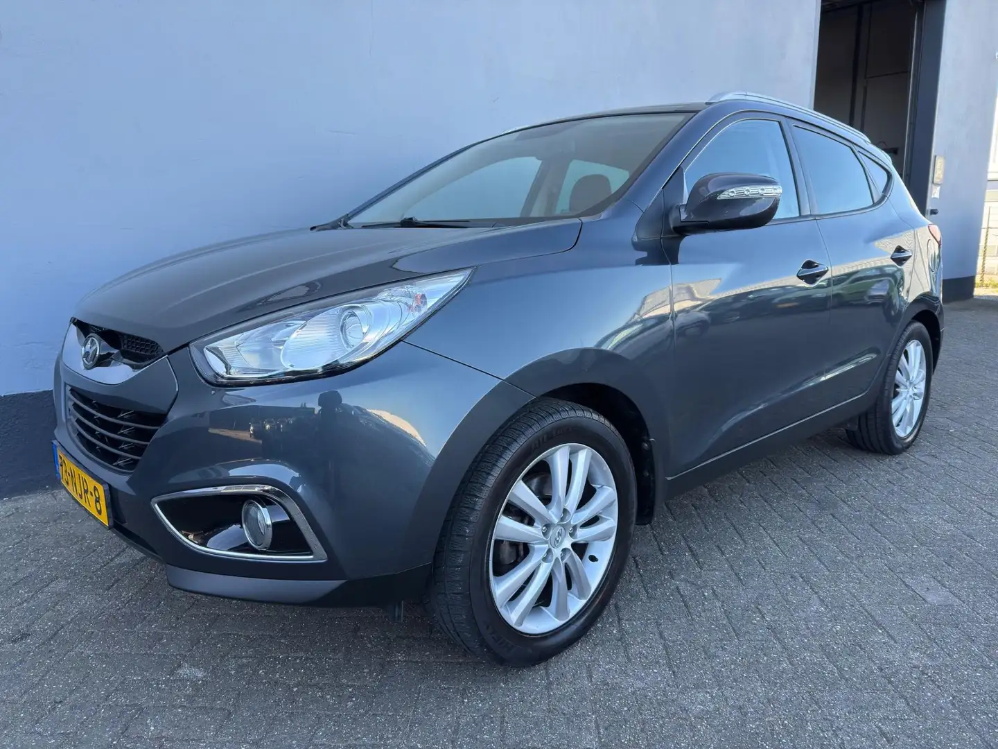 Hyundai iX35 2.0i i-Catcher Automaat - Navigatie - Lederen Inte Grijs - 1