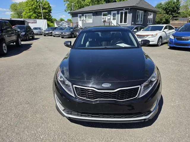Kia Optima 2011 — photo 2