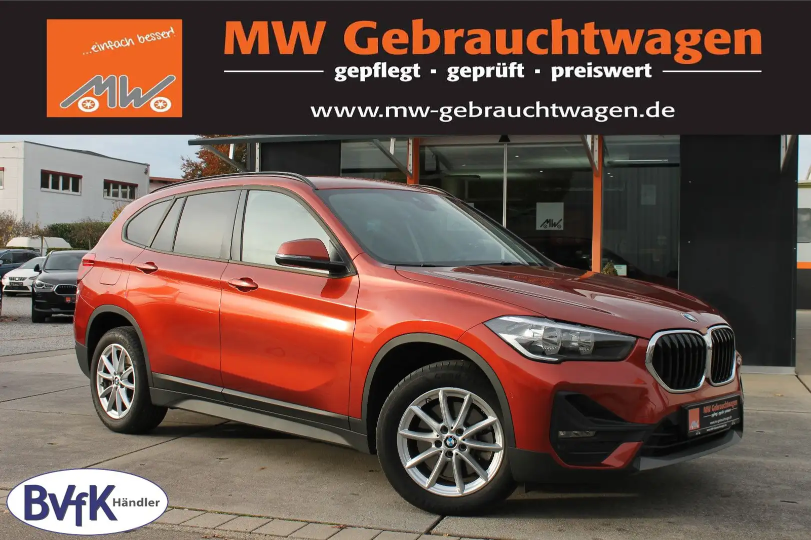 BMW X1 sDrive 20i Steptr. Advantage KAM PDC SHZ TEMP Orange - 1