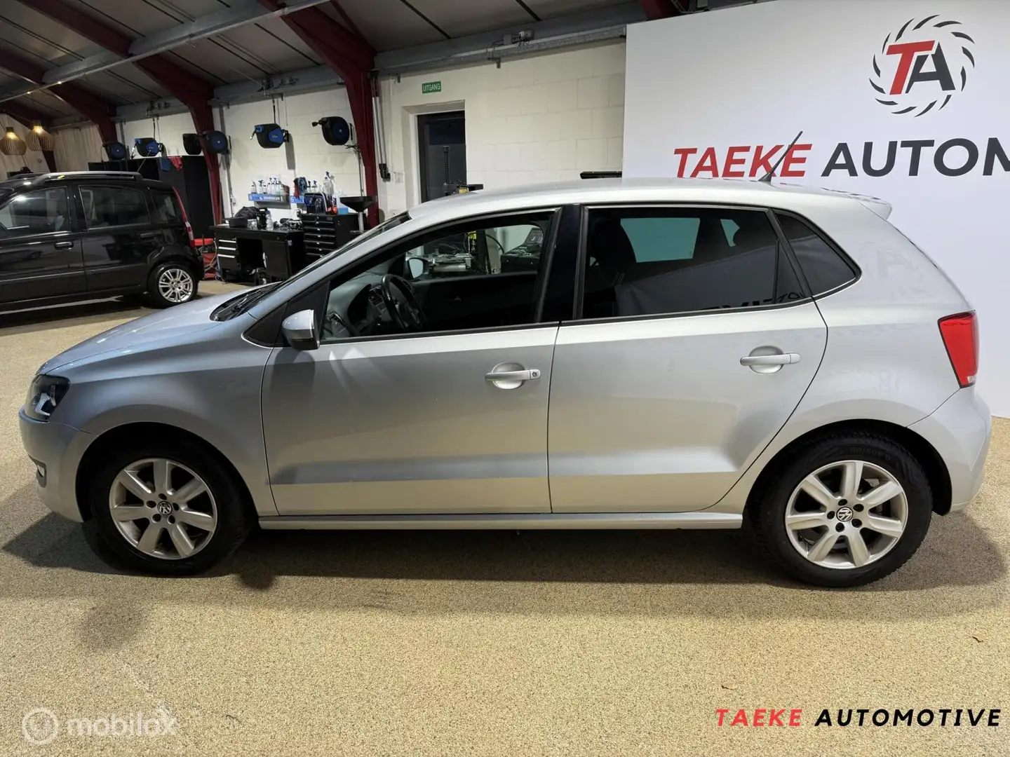 Volkswagen Polo 1.4-16V Highline Clima/Cruise/Nap Gris - 2