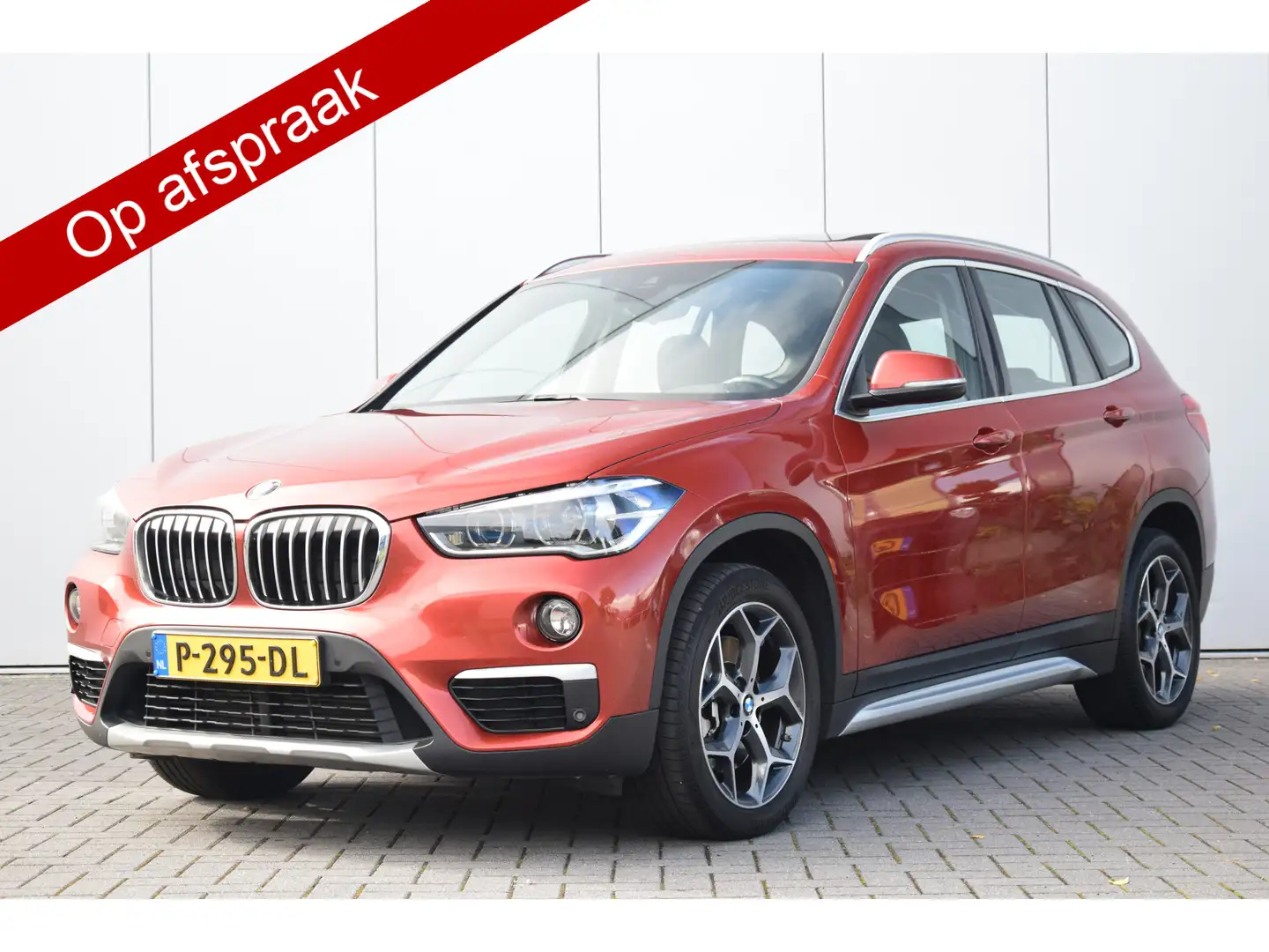 BMW X1 xDrive25d High Executive X-Line Pano/Dak Leer/Spor Orange - 1