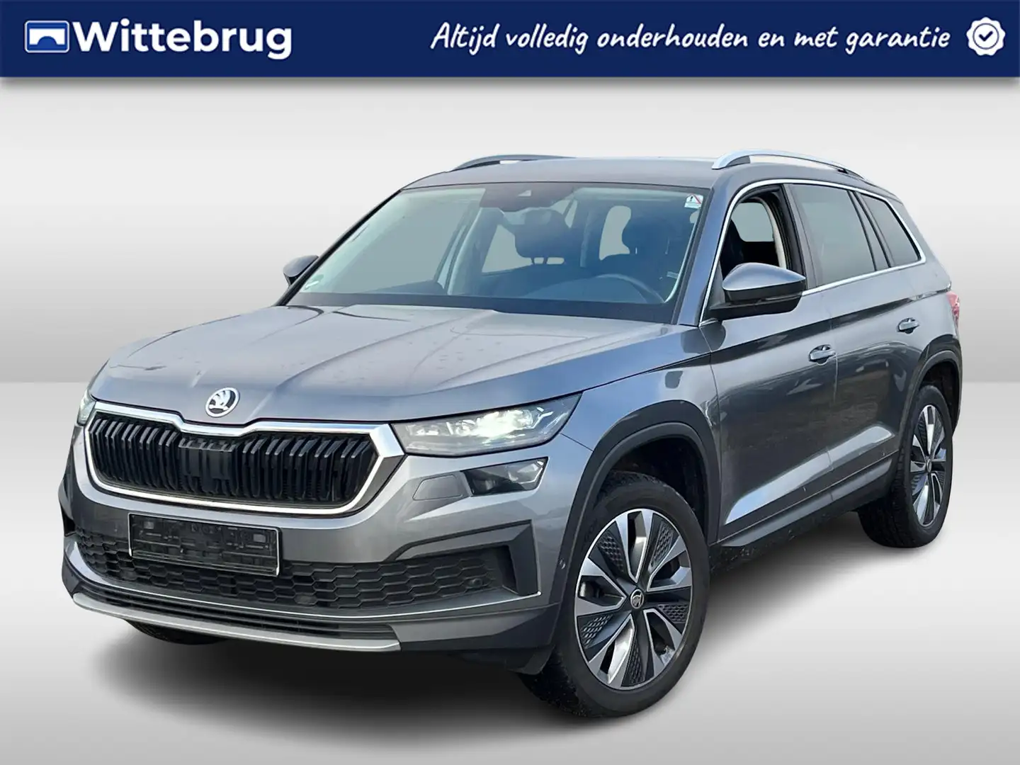 Skoda Kodiaq 1.5 TSI 150pk Ambition DSG AUTOMAAT / Navigatie / Grijs - 1