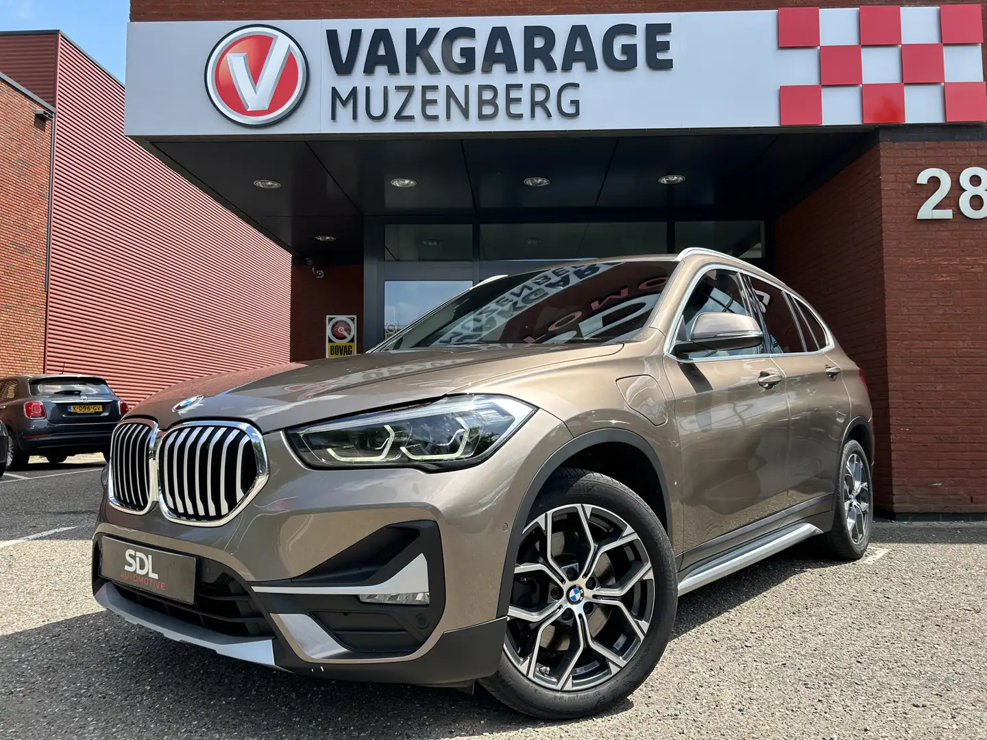 BMW X1 xDrive25e High Executive // FULL LED // NAVI // CA Brun - 1