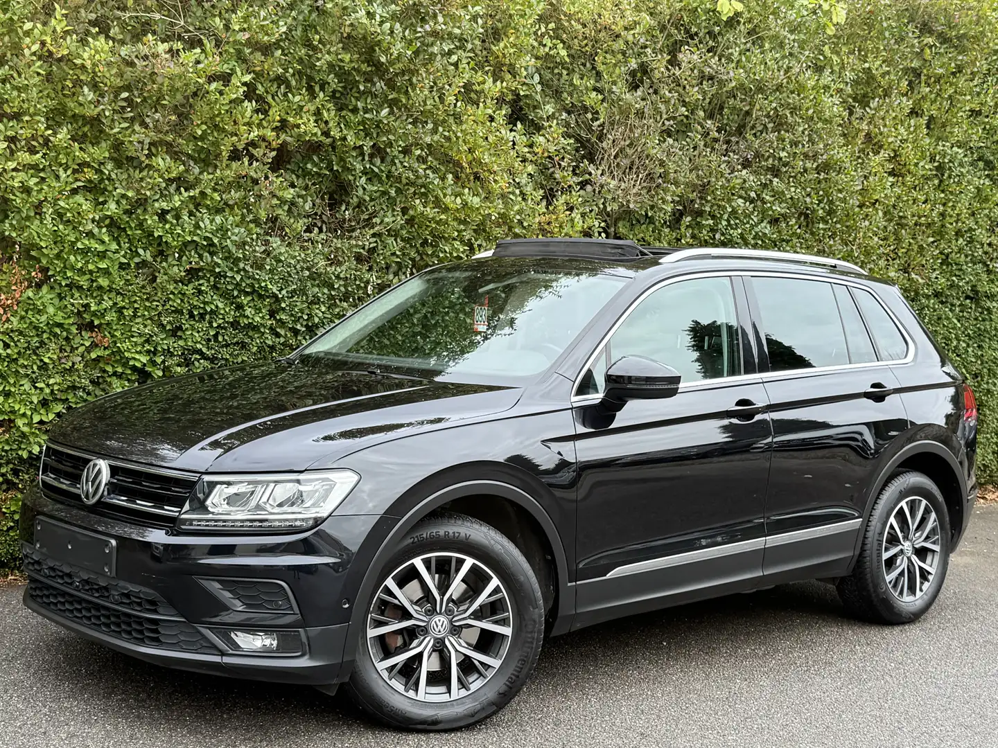 Volkswagen Tiguan 2.0 TDi 4Motion+NAVI+CAMERA+TOIT OUVR+CUIR+EU 6B Zwart - 1