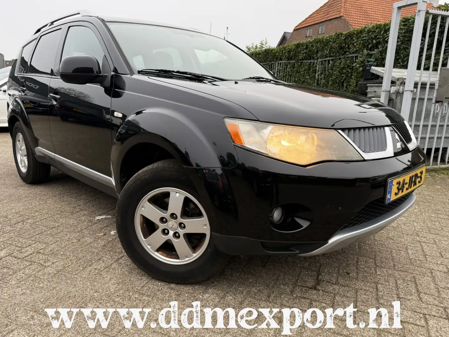 Mitsubishi Outlander 2.4 INSPIRE CLIMATE/LMV/TREKHAAK Noir - 1