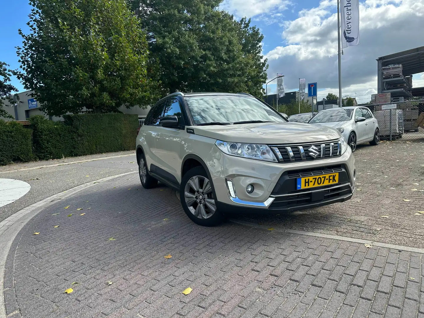 Suzuki Vitara 1.0 Boosterjet Trekhaak/Cruise/Navi/Clima/Camera Bruin - 1
