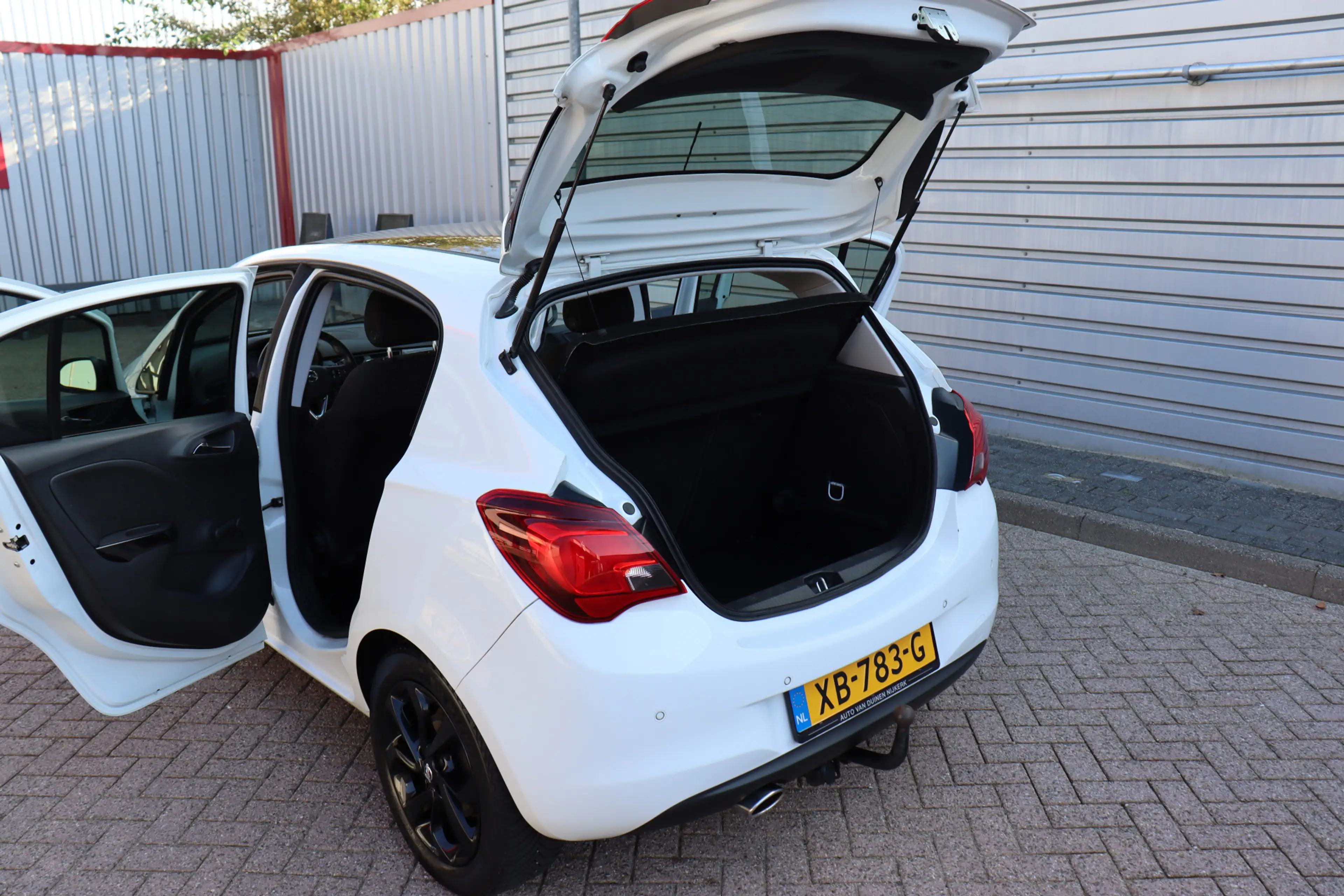 Opel Corsa 1.4 Black Edition O.a: PDC, Trekhaak, DAB, Carplay — photo 25