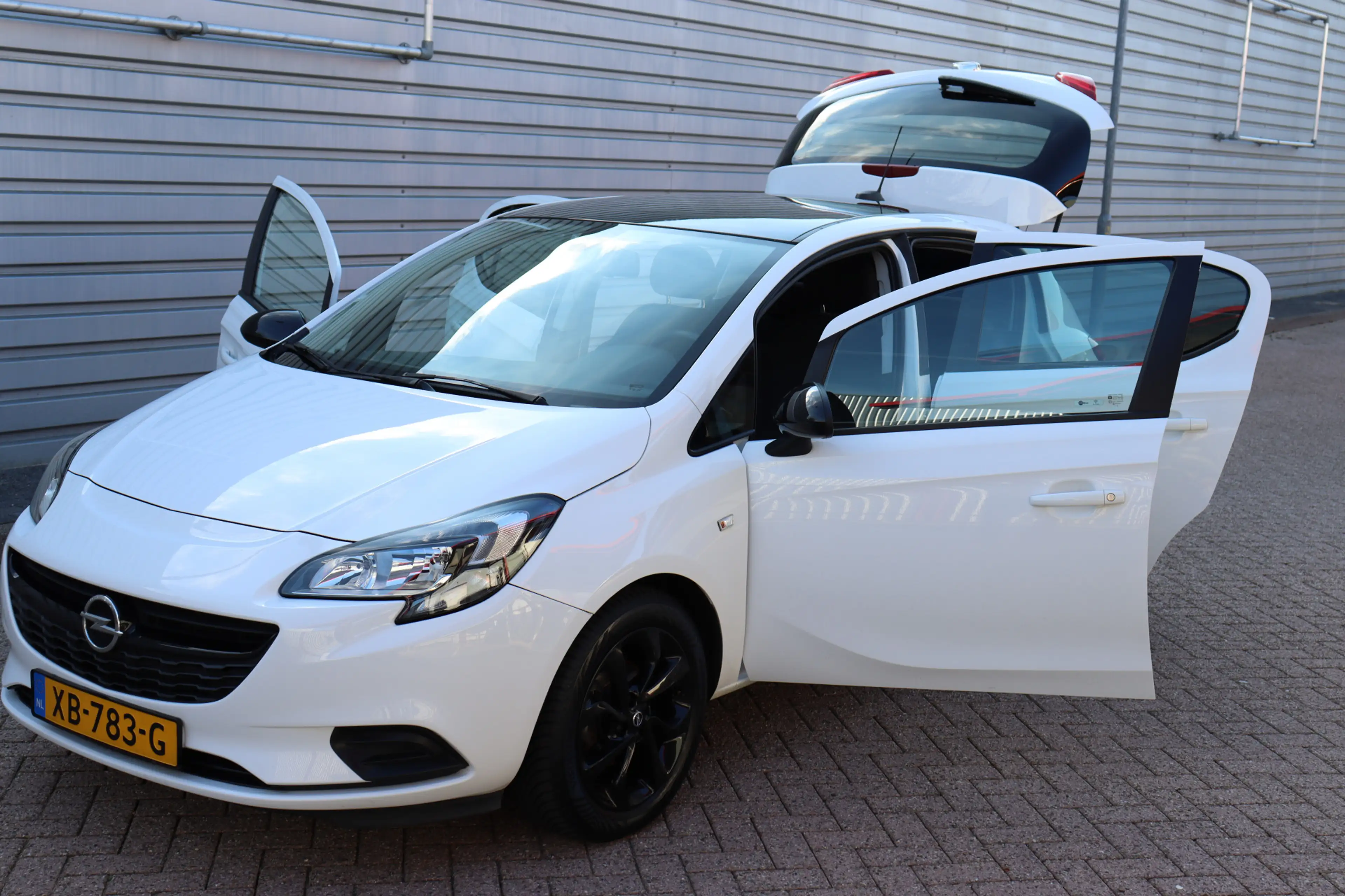 Opel Corsa 1.4 Black Edition O.a: PDC, Trekhaak, DAB, Carplay — photo 21