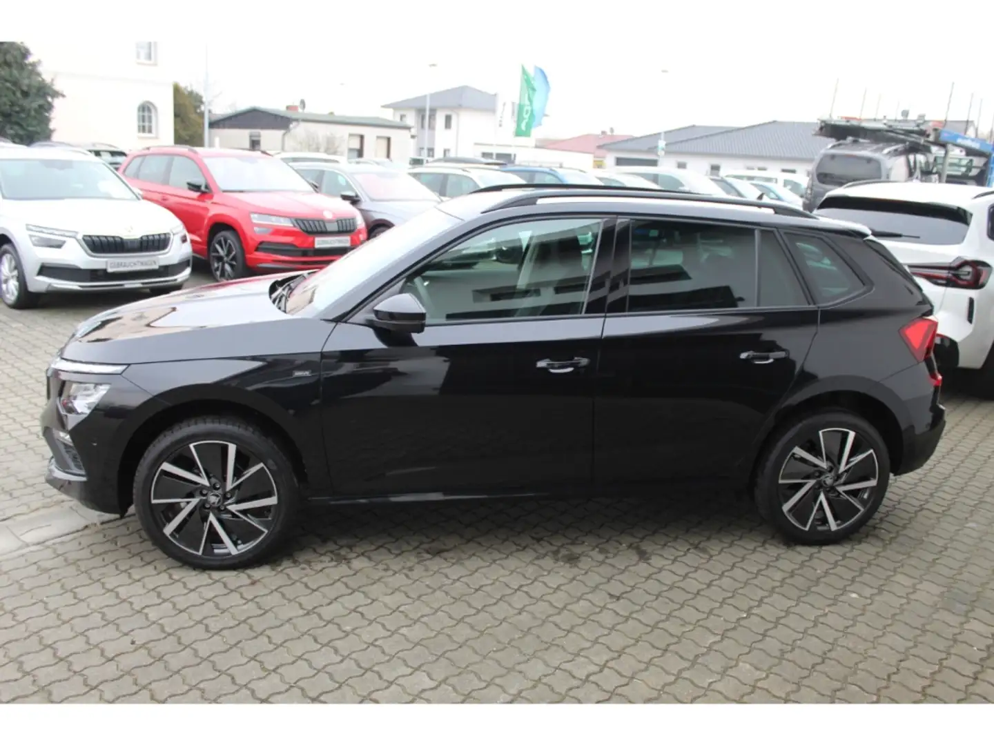 Skoda Kamiq Selection 1.5 EU6e Drive 1,5 TSI 110 kW 7-Gang-DSG Schwarz - 2