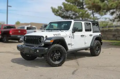 White 2025 Jeep Wrangler Willys 4-Door 4WD SUV / Crossover Four-Wheel Drive 6-Speed Manual