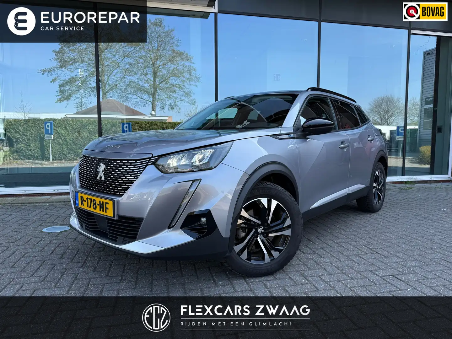 Peugeot e-2008 EV Allure Pack 50 kWh - 3Fase - Navi - Parkeerhulp Šedá - 1