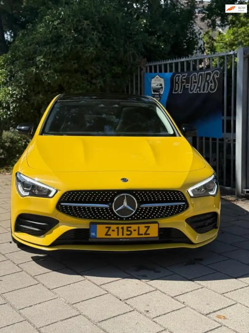 Mercedes-Benz CLA 180 AMG Line | Edition 1 | Panoramadak | Geel | 2019 Geel - 1