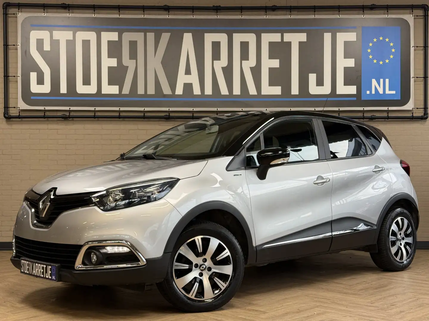 Renault Captur 0.9 TCe 90pk Limited | Navi | Cruise control | 16" Grijs - 1